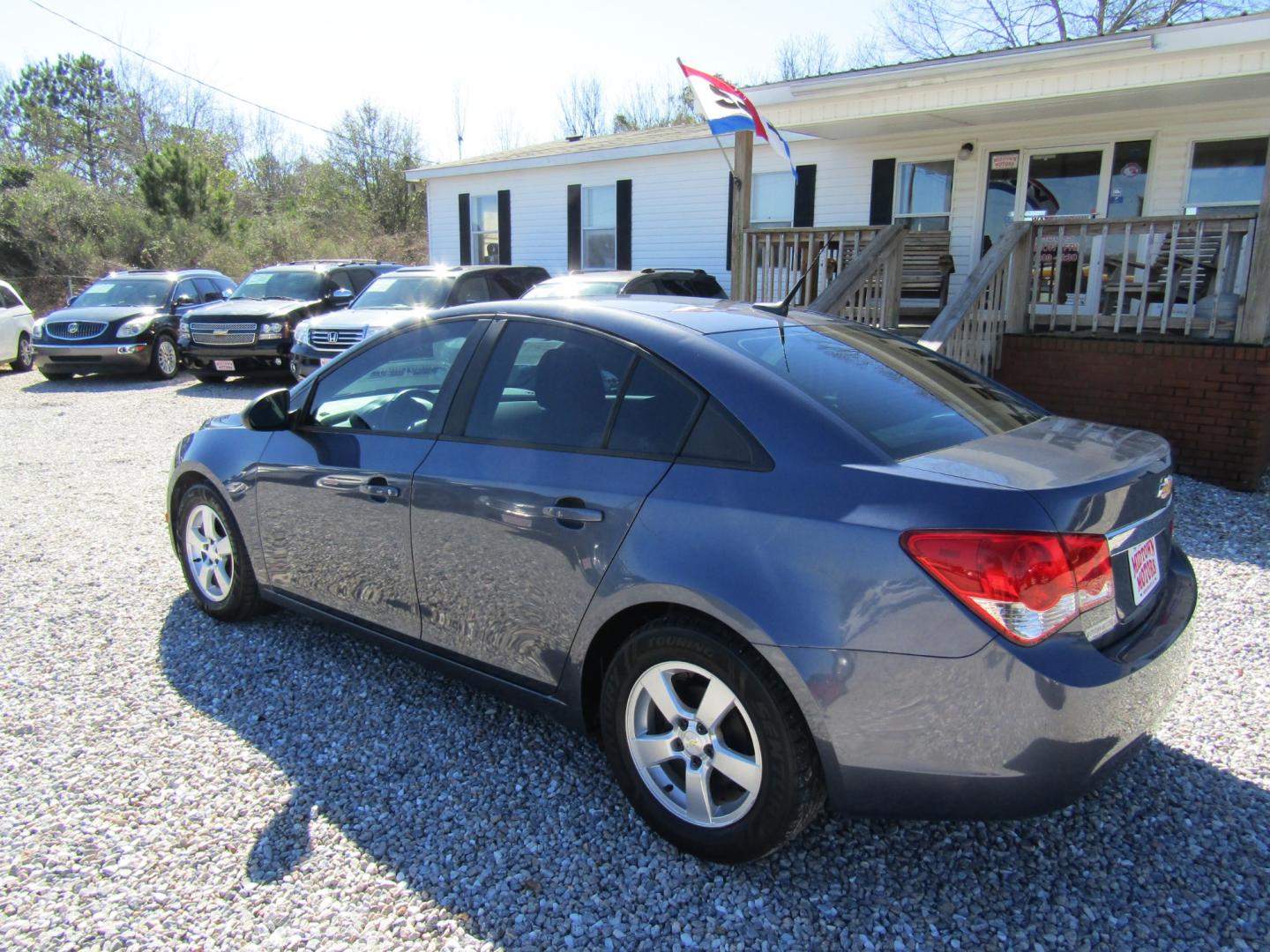 2014 Blue Chevrolet Cruze LS Auto (1G1PA5SH4E7) with an 1.8L L4 DOHC 16V FFV engine, Automatic transmission, located at 15016 S Hwy 231, Midland City, AL, 36350, (334) 983-3001, 31.306210, -85.495277 - Photo#5